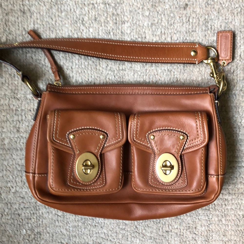Coach shoulder bag with front flap pockets
